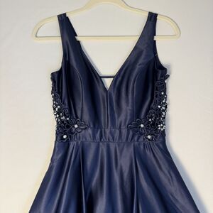 1020 Size 3 navy City Studio satin a line gown with floral cut outs v neck